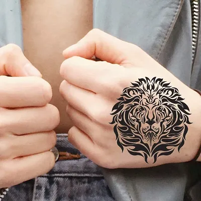 Lion tattoo | Lion hand tattoo men, Lion hand tattoo, Hand tattoos for guys