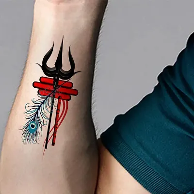 lord Shiva trishul with hand band tattoo. #Tattoo done by Pooja Tandel... |  TikTok