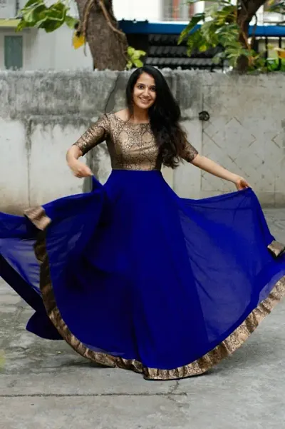 Stunning Blue Georgette Self Design Stitched Gown For Women