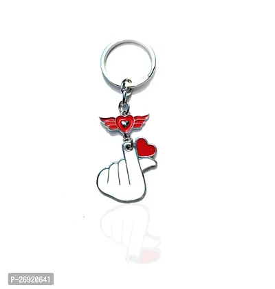 Index Finger And Thumb Crossed Heart Flying Keychain