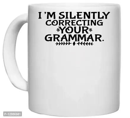 UDNAG White Ceramic Coffee / Tea Mug 'Teacher | I?M Silently Correcting Your Grammar' Perfect for Gifting [330ml]