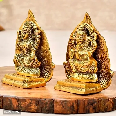 Haridwar Divine Antique Gold Plated Metal Lakshmi Ganesh Pair with Leaf Background
