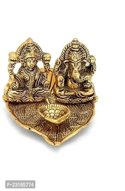 Haridwar divine  Golden Polished Laxmi Ganesh on Leaf with diya