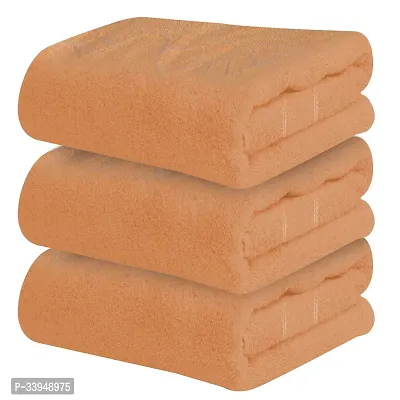 Comfortable Orange Cotton Self Pattern Bath Towels Pack of 3