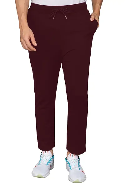 Stylish Cotton Blend Solid Regular Track Pants For Men