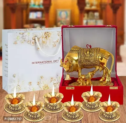 International Gift Golden Kamdhenu Cow Statue Oxidized Finish with Luxury Velvet Box Pack and Beautiful Carry Bag Showpiece for Home Decor (Diya Set of 6 Pics)