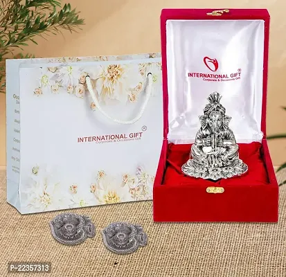 International Gift Silver Metal Cymbal Ganesh Idol With Om Diya With Beautiful Red Box Packing With Carry Bag, 11.5H X 11W X 9.5L Cm