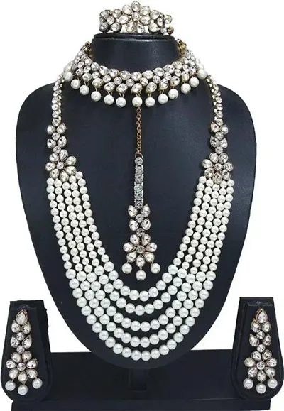 Shimmering Alloy Jewellery Set For Women- 2 Necklaces , 1 Pair Of Earrings , 1 Mangtikka And 1 Bracelet