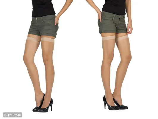 Black top, beige shorts with a high waist and black pantyhose with
