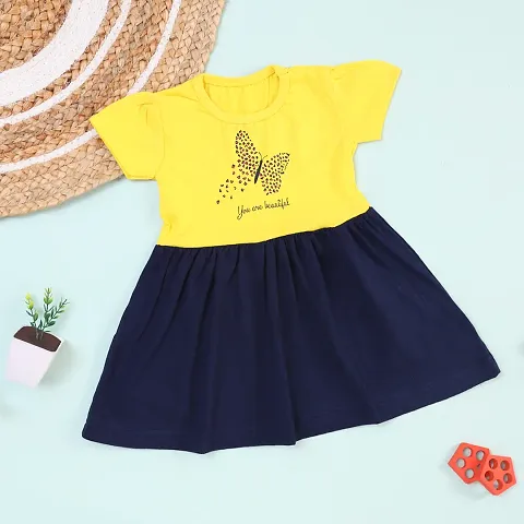 Stylish Yellow Cotton Printed Dress For Girls