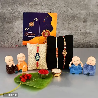 Great Art Rakhi  Gift Set for Brother [Gift Combo - Rakhi with Cute Car Dashboard Polynesin Buddha Statue Set of 4 Rakshabandhan Special Card, Roli Chawal-GA-022-710-4