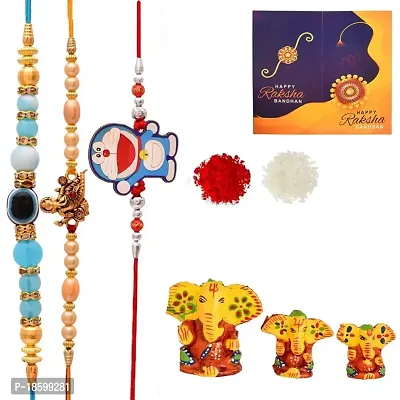 Great Art Rakhi for Brother and Bhabhi with Ganesh Idol Combo Set |Combo of 5 (1 Ganesh Idol, 1 Lumba, 1 Rakhi, 1 Roli Chawal Pack, 1 Greeting Card)-101-6-thumb0