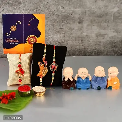 Great Art Rakhi  Gift Set for Brother [Gift Combo - Rakhi with Cute Car Dashboard Polynesin Buddha Statue Set of 4 Rakshabandhan Special Card, Roli Chawal-GADH-022-710-3