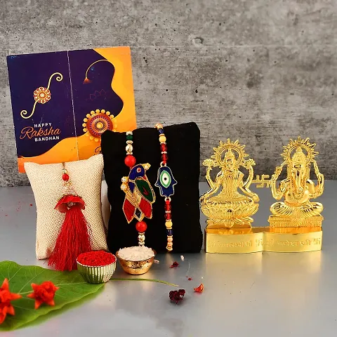 Great Art Rakhi Gift Hamper for Brother - Gold Plated Ganesha Lakshmi Set for Gifting and Rakhi Combo Gift Set with Tilak Material & Greeting Card