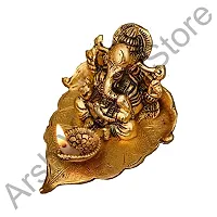 Metal Lord Ganesha On Leaf with Diya Ganpati Murti Religious Idol for for Pooja Room-thumb1