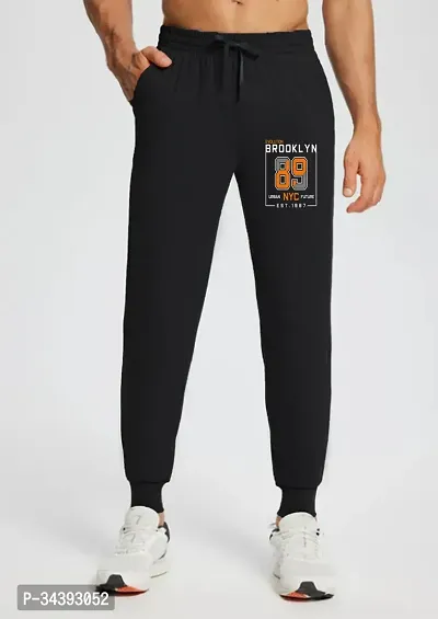 Stylish Black Cotton Blend Solid Regular Track Pants For Men-thumb0