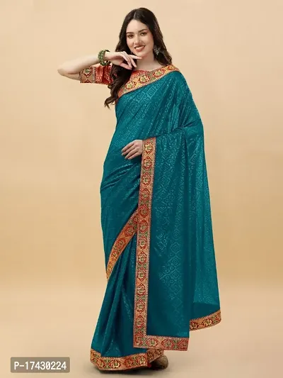 Embossed Silk Blend Saree With Elephant Lace Border And Latkan